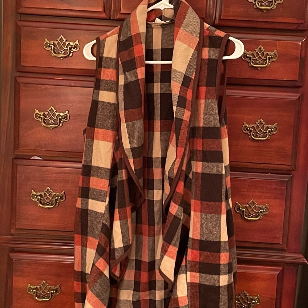Gently used plaid vest